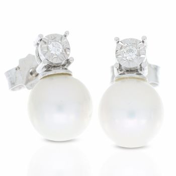 Pearls and diamond earrings